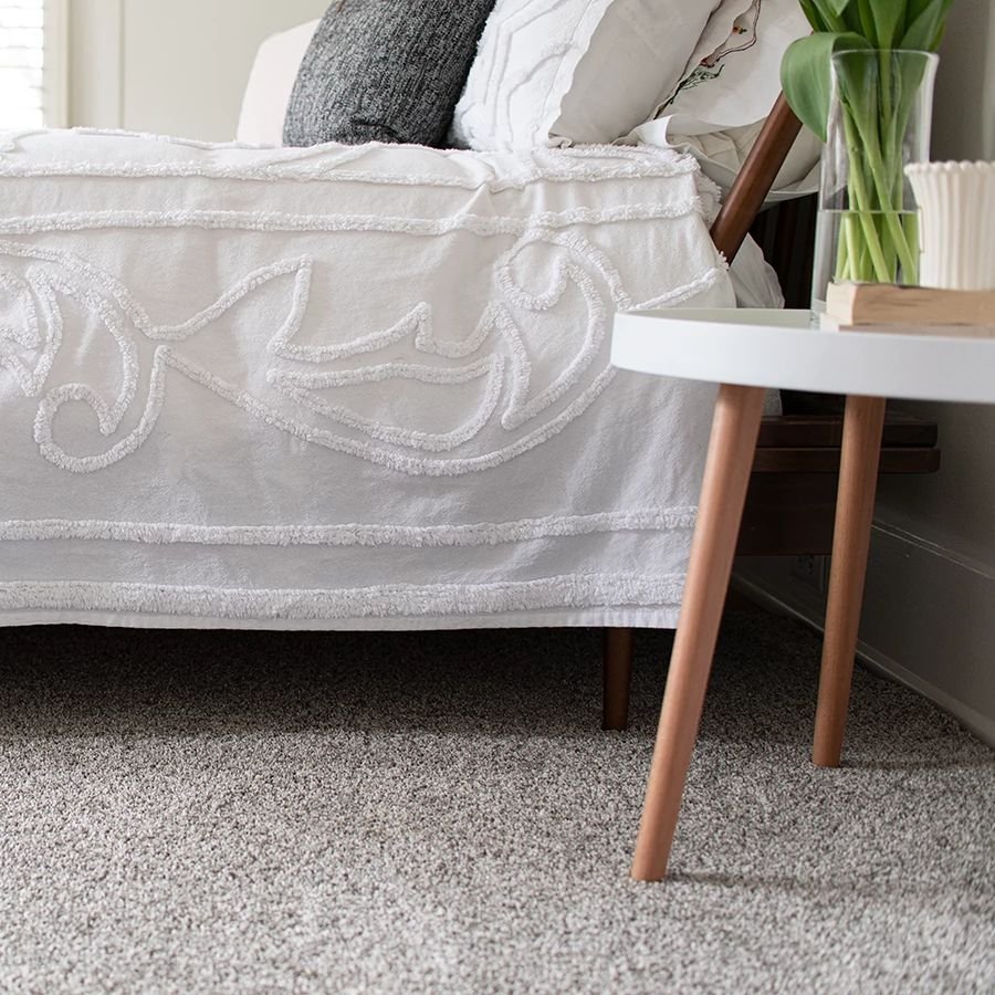 bed with side table on carpet - shaw 2021 lookbook