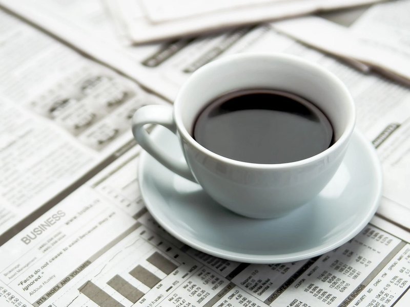 coffee on a newspaper - Shamrock Carpets in Uniontown, PA